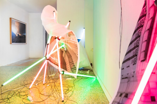 24 Hour Bail Bonds Service, 2020<br> 
B&W photographs<br> 
Coloured T8 fluorescent tubes.<br>