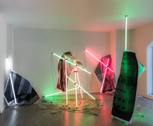24 Hour Bail Bonds Service, 2020<br> 
B&W photographs<br> 
Coloured T8 fluorescent tubes.<br>