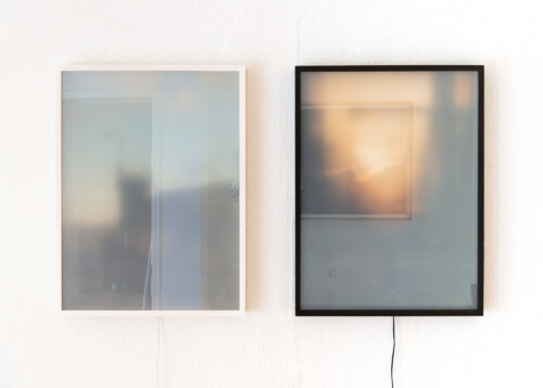 Checkpoint/Entrance<br>
2020<br>
diptych, inkjet prints, each panel 60x80cm, opacity changing glass, motion detectors.